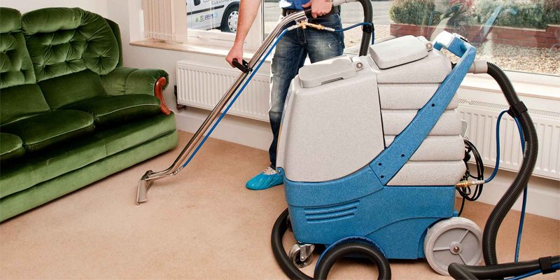 Professional carpet cleaning service in action with specialized equipment, showcasing the importance of deep cleaning for commercial and industrial settings.